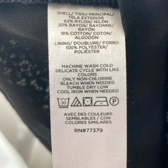 Ann Taylor factory size XL black lace top lined with ruffle sleeve cuff. - Picture 9 of 9